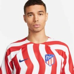 Nike Men's Athletico Madrid 2022/23 Stadium Home Jersey - White/Deep Royal 12 Nike Men's Athletico Madrid 2022/23 Stadium Home Jersey - White/Deep Royal -Daily Flex Shop DM1838 101 PHSYM001