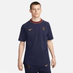 Nike Men's Paris Saint-Germain Travel Short Sleeve Soccer Top - Blackened Blue/Team Red/Gold Suede