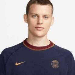 Nike Men's Paris Saint-Germain Travel Short Sleeve Soccer Top - Blackened Blue/Team Red/Gold Suede -Daily Flex Shop download 22 4c36b34d 2a70 4a19 b17b 163c75ba01ec